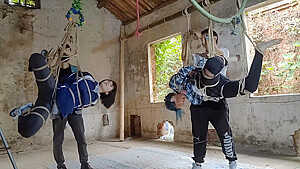 Two Girls Suspended In An Abandoned House